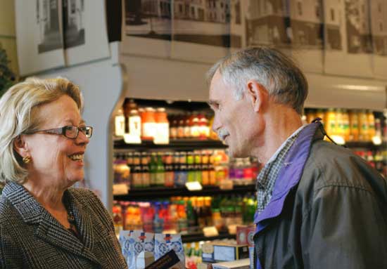 Congresswoman Niki Tsongas speaks with Frank Paxson at the General Store on Oct. 24 during her Congress on Your Corner program. For nearly three hours Tsongas and her staff met with dozens of people from Harvard and surrounding towns to hear their concerns and needs. (Photo by Sue Fitterman)