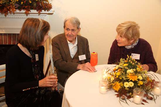 From left: Margaret Nestler, Erhart Muller, and Marie Finnegan chat at a Harvard Conservation Trust party held at Fruitlands Museum in October to celebrate Muller, one of the Trust's founders. Muller turned 100 years old in August.