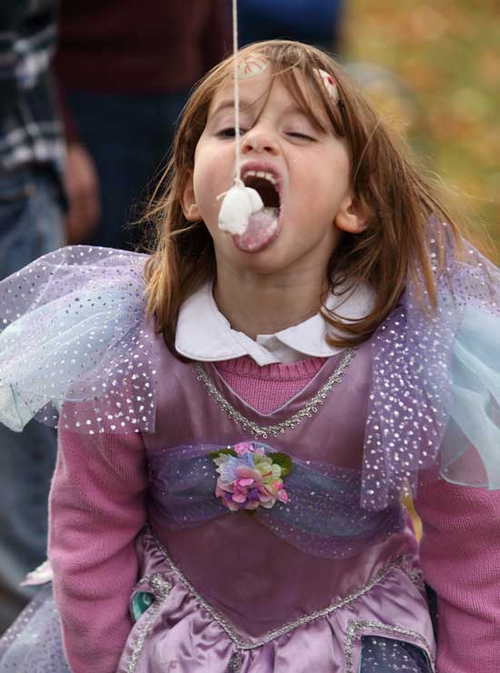 Sophie Thompson ends up a powdered-dougnut princess at the Harvard Family Association's Halloween celebration on Oct. 31.  