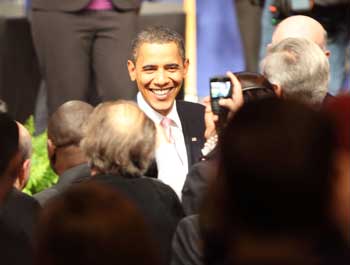 President Obama shakes hands with people in the front row. (Photo by Lisa Aciukewicz) President Obama shakes hands with people in the front row. (Photo by Lisa Aciukewicz)