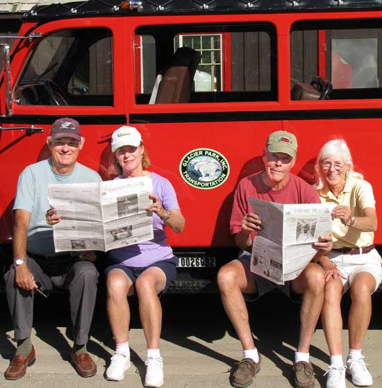 Bill and Sherry Cory of Ayer Road forwarded the Press to Dick and Phyllis Clawson of Tahanto Trail (right) where they are campground hosts at Glacier National Park in Montana. They are sharing the hometown news with Phil and Terri Knoettner (left) of Slough Road.