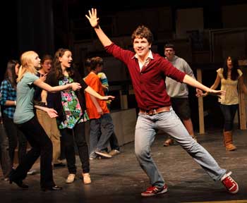 Owen Alderson takes center stage at a rehearsal of Zombie Prom, a middle school musical that will run Dec. 4, 5, 11, and 12 in Bromfield’s Cronin Auditorium. Other cast members from left: Tricia Brewer, Emma Sullivan, Diane LaMattina, Emma Hall, John Bakis, Dan Jackson, and Marcelle Hazoury. (Photo by Lisa Aciukewicz) Owen Alderson takes center stage at a rehearsal of Zombie Prom, a middle school musical that will run Dec. 4, 5, 11, and 12 in Bromfield’s Cronin Auditorium. Other cast members from left: Tricia Brewer, Emma Sullivan, Diane LaMattina, Emma Hall, John Bakis, Dan Jackson, and Marcelle Hazoury. (Photo by Lisa Aciukewicz)
