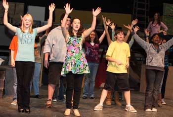 From left: Emma Sullivan, Dan Jackson, Emma Hall, Kelly O’Shea, Danny Hayward, Jenny Watts (rear), and Therese Philippe practice a musical number from Zombie Prom. (Photo by Lisa Aciukewicz) From left: Emma Sullivan, Dan Jackson, Emma Hall, Kelly O’Shea, Danny Hayward, Jenny Watts (rear), and Therese Philippe practice a musical number from Zombie Prom. (Photo by Lisa Aciukewicz)