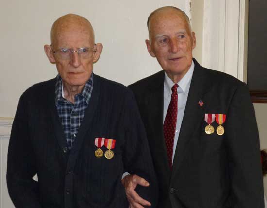 Twin brothers Paul ("PJ") and Peter Johnston attend a Veterans Day ceremony at which they received Army Good Conduct medals and National Defense Service medials. PJ passed away on November 29. (Photo by Kelly S. Lyddy)