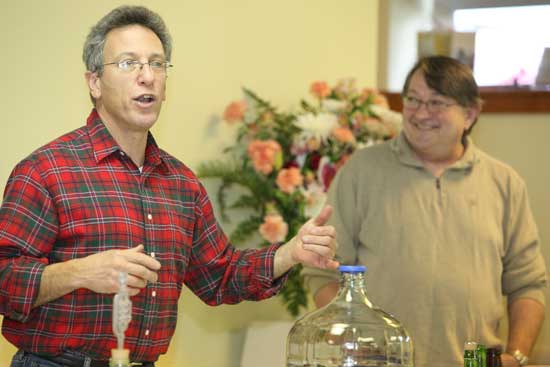 Bromfield Chef Paul Correnty (left) and Steve Patt speak about cider making at the Harvard Woman’s Club meeting on Dec. 7.