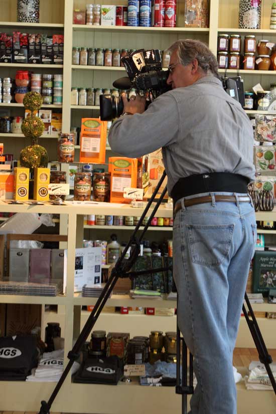 Channel 5 cameraman Carl Viera gets some footage of the General Store for a segment of the WCVB show Chronicle. 