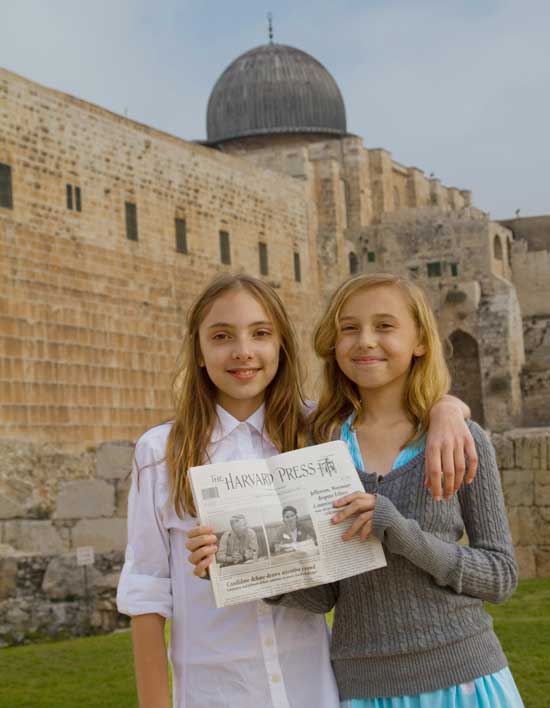 Michaela Nickerson (left) and her sister Rebecca with the Press at the southern wall of the Temple Mount iin Jerusalem.