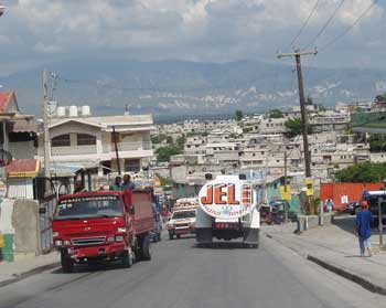 A water tanker travels down a road in Port-au-Prince. (Photo by Libby Levison) A water tanker travels down a road in Port-au-Prince. (Photo by Libby Levison)