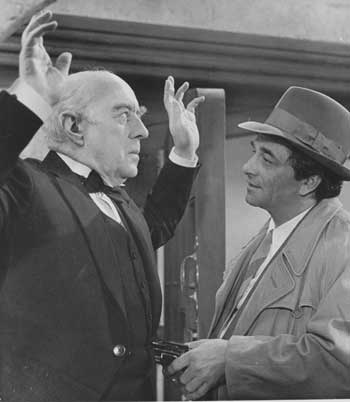 Alec Guinness and Peter Falk in Murder by Death. (Courtesy photo) Alec Guinness and Peter Falk in Murder by Death. (Courtesy photo)