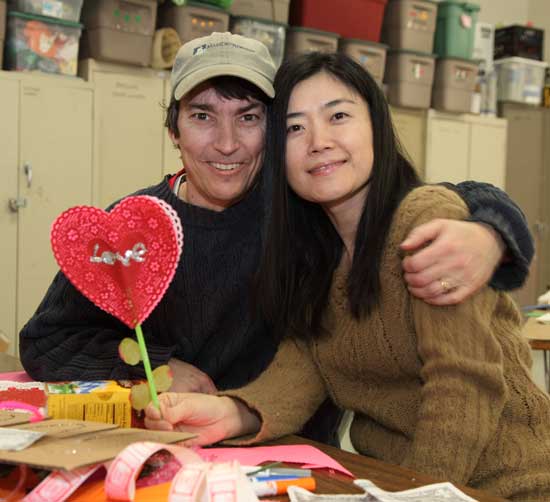 Proving Valentine-making isn't just for kids, Brian and Kyounghee McNulty pose with their Valentines.