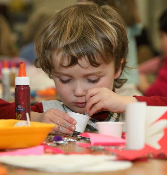 Wyatt Neville works diligently on his Valentine.
