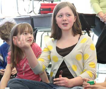 Left: Rebekah Lindsey (left) listens as Emma Stoeffel explains how her mother, who works in another school system, has been able to employ with her own students some of the anti-bullying techniques she’s learned from Emma. (Photo by Lisa Aciukwicz) Left: Rebekah Lindsey (left) listens as Emma Stoeffel explains how her mother, who works in another school system, has been able to employ with her own students some of the anti-bullying techniques she’s learned from Emma. (Photo by Lisa Aciukwicz)
