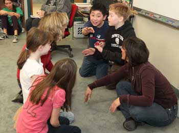 “You can’t sit here!” shouts Eric Xing (center) in a role-playing game with his classmates about excluding students at the lunch table. (Photo by Lisa Aciukwicz) “You can’t sit here!” shouts Eric Xing (center) in a role-playing game with his classmates about excluding students at the lunch table. (Photo by Lisa Aciukwicz)