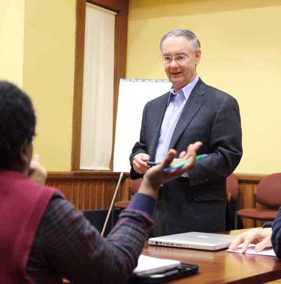 Harvard resident Stephen Ford, founder and CEO of Fitzgerald, Stevens & Ford, discusses strategies at a job search seminar in Volunteers Hall on March 2.