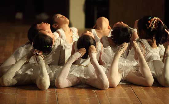 Members of Angel Performance Art in Acton strike a pose as they perform  “Spring Dance.”