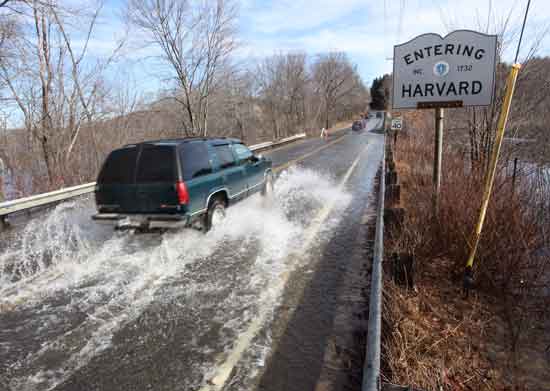 After a weekend nor'easter dropped more than six inches of rain in three days, Route 110 was barely passable at the Harvard/Bolton town line, and vehicles passed at their own risk on March 16.