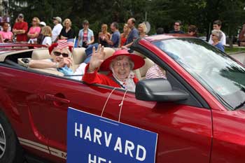 Phyllis Newman waves from the Harvard Help float as she rides down Mass. Ave. in last summer’s Fourth of July parade. (Photo by Lisa Aciukewicz) Phyllis Newman waves from the Harvard Help float as she rides down Mass. Ave. in last summer’s Fourth of July parade. (Photo by Lisa Aciukewicz)