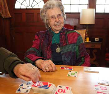 Phyllis Newman awaits her turn as she plays SkipBo with her friends at Hildreth House. (Photo by Lisa Aciukewicz) Phyllis Newman awaits her turn as she plays SkipBo with her friends at Hildreth House. (Photo by Lisa Aciukewicz)