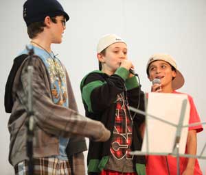 From left: Noah Dyer, Nick Evans, and Ben Siddiqui perform an original composition, “Bully in Da Halls.” From left: Noah Dyer, Nick Evans, and Ben Siddiqui perform an original composition, “Bully in Da Halls.”