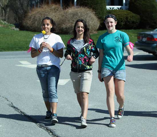 From left, Jackie Lee, Emma Keaney, and Aliza Maki finish the final steps.