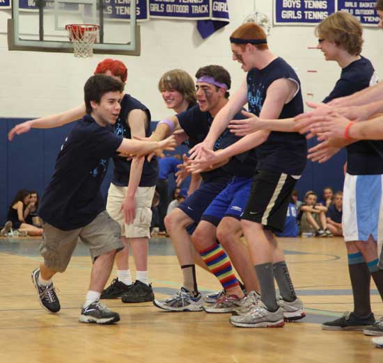 Danny Eisenberg tags teammates Sam Aney, Jake Basille, Mike Chadwick, and Teddy Bunker
