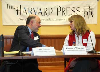 Stu Sklar and Kirsten Wright shake hands at the end of their debate. (Photo by Lisa Aciukewicz) Stu Sklar and Kirsten Wright shake hands at the end of their debate. (Photo by Lisa Aciukewicz)