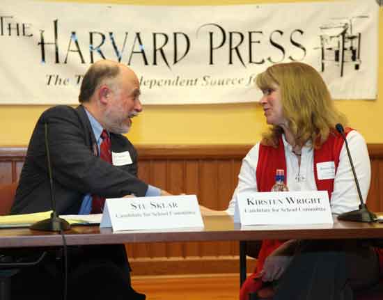 Stu Sklar and Kirsten Wright, candidates for School Committee, shake hands at the end of a debate sponsored by the League of Women Voters of Harvard and the Harvard Press on April 13.