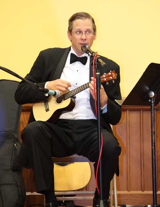 Tim Clark delivers a playful version of the Beatles’ “I Feel Fine.”