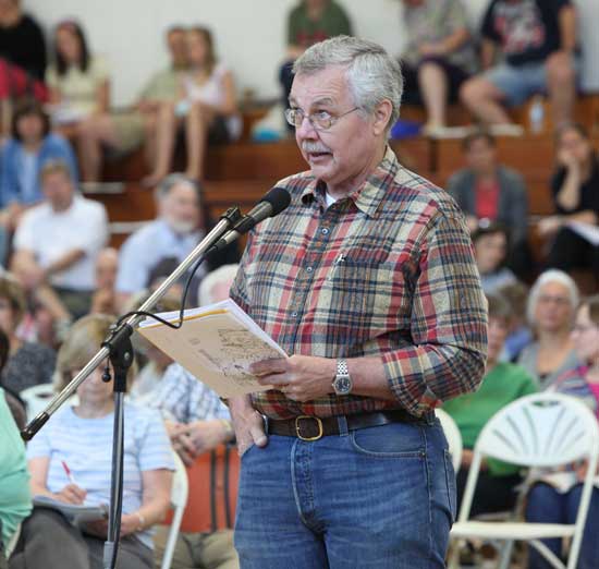 Stow Road resident Hal Korstvedt takes the microphone.