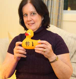 Louisa Roof holds up a rubber duck, like the one that won her dinner anywhere in the world compliments of the Ayer, Harvard, Shirley Rotary Club. Roof won the grand prize in the annual Ducky Wucky race on the Nashua River. (Photo by Lisa Aciukewicz) Louisa Roof holds up a rubber duck, like the one that won her dinner anywhere in the world compliments of the Ayer, Harvard, Shirley Rotary Club. Roof won the grand prize in the annual Ducky Wucky race on the Nashua River. (Photo by Lisa Aciukewicz)