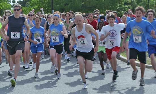 More than 300 runners spring off the starting line.