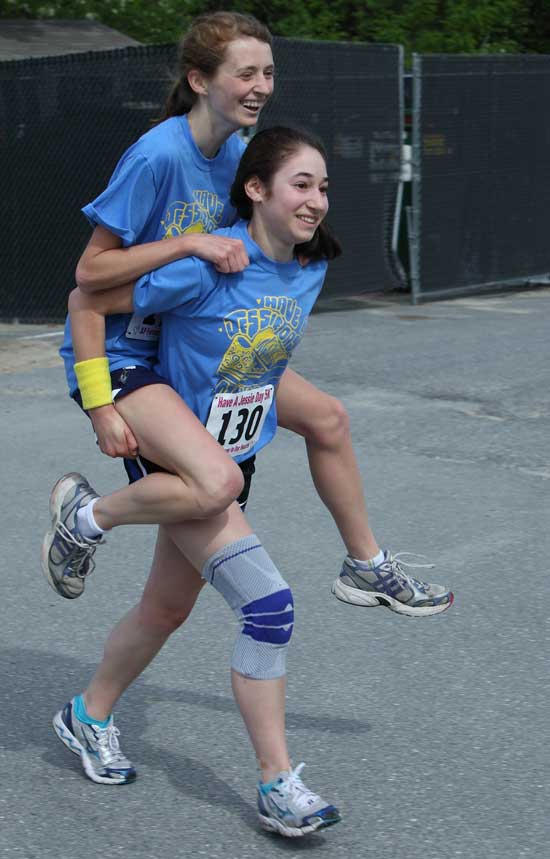 Alice Kennedy approaches the finish line in style atop Rachel Leicher.