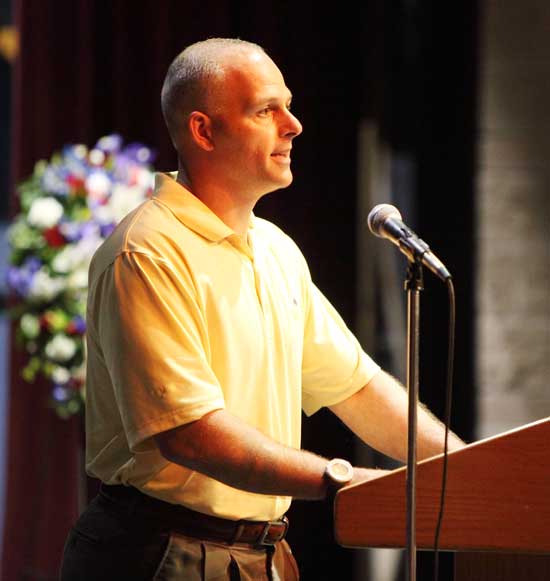 Oleh Dutkewych, Bromfi eld Class of 1985, delivers a Memorial Day speech in which he thanks the town’s veterans for their service and talks about his own.