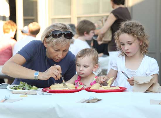 Jenn, Cate, and Ella Corbett enjoy their pasta.