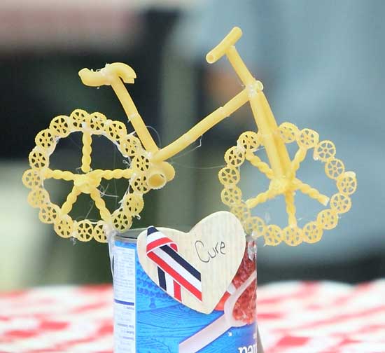 Bicycle centerpieces serve as a nod to another cancer fundraiser, the Pan Mass Challenge bicycle race.