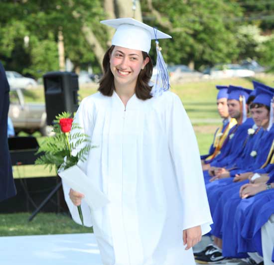 Mina Rae Beckman picks up the William Post award. She was also recognized with a scholarship from the Harvard Ambulance Service.