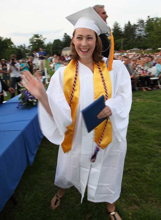 A happy Jenny Duckett receives her diploma.