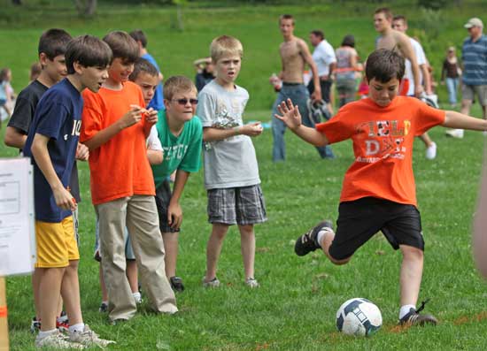 From left, Tristan Cronin, Colin Grant, Ben Marinelli, Ethan Fitzsimmons, Devin Fleming, and Alec Jones watch as Joey Calabresi prepares to kick.