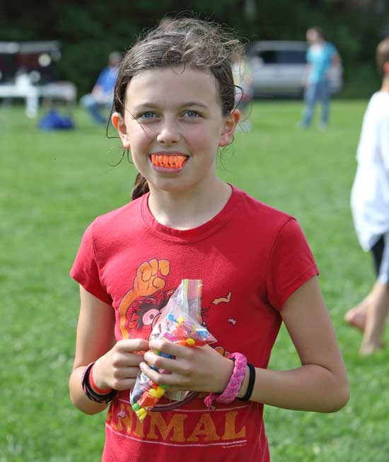 Third-grader Isabel Barton prepares for the next Twilight movie with a set of vampire teeth.