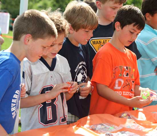Jack Shelton, Colin Stevens, Patrick Flannagan, and Joey Calabresi check out the prizes.