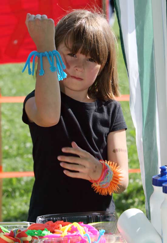 Natalie L'Ecuyer shows off a new bracelet at the prize table.