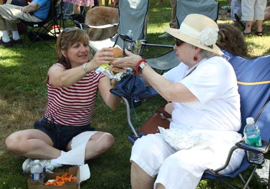 Melissa Marteney and Arline Marteney share an order of burgers.