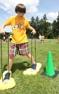 George Hynes tackles the obstacles course in last spring’s field day. Field day is just one way Barbi Kelley gets her students excited about exercise. (File photo) George Hynes tackles the obstacles course in last spring’s field day. Field day is just one way Barbi Kelley gets her students excited about exercise. (File photo)