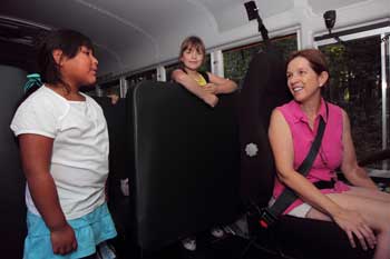 From left, Elizabeth Cohen, Emily Riddle, and Maud Goodwin talk about their summer vacations on the first day of school. (Photo by Lisa Aciukewicz) From left, Elizabeth Cohen, Emily Riddle, and Maud Goodwin talk about their summer vacations on the first day of school. (Photo by Lisa Aciukewicz)