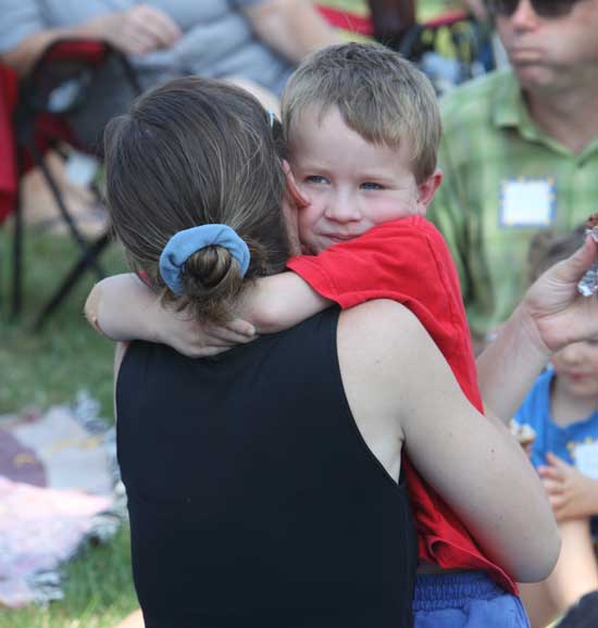 Harry Burns checks in with mom with a spontaneous hug.