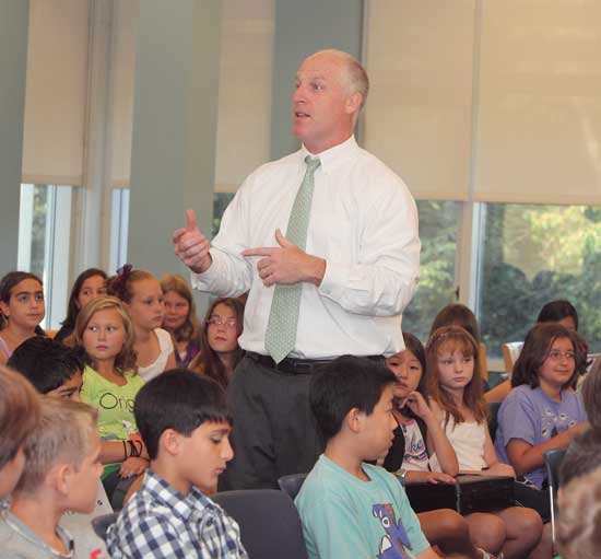 Principal Jim O’Shea welcomes the sixth-grade class to Bromfield on their first day as middle schoolers.