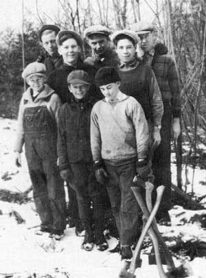 A group of Boy Scouts from Harvard Troop 1 takes a break from clearing wood in the town forest in the 1930s. (Photo courtesty of the Harvard Historical Society) A group of Boy Scouts from Harvard Troop 1 takes a break from clearing wood in the town forest in the 1930s. (Photo courtesty of the Harvard Historical Society)