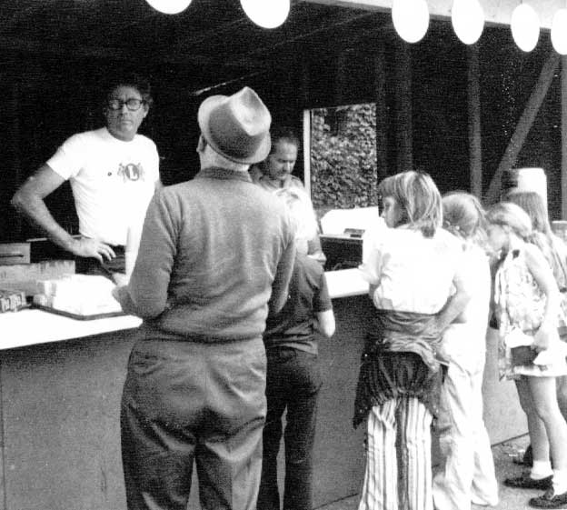 Market-goers stop to fuel up at the Lions Club booth at a flea market in the 1970s. (Photo courtesy of the League of Women Voters of Harvard)