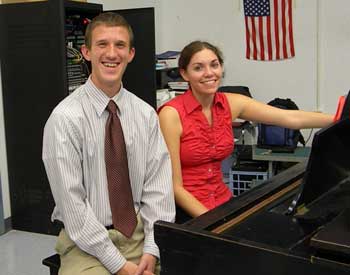 Band Director Collin Myers and Choral Director Talia Mercadante take a break between classes. (Photo by Vishwa Rasania) Band Director Collin Myers and Choral Director Talia Mercadante take a break between classes. (Photo by Vishwa Rasania)