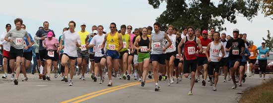 Runners take off down Propect Hill Road at the start of the 10K Apple Harvest Ramble on Oct. 3. Joe Hegarty (number 215 above right) of Springfield took an early lead in the race and never looked back, finishing with a time of  32:58